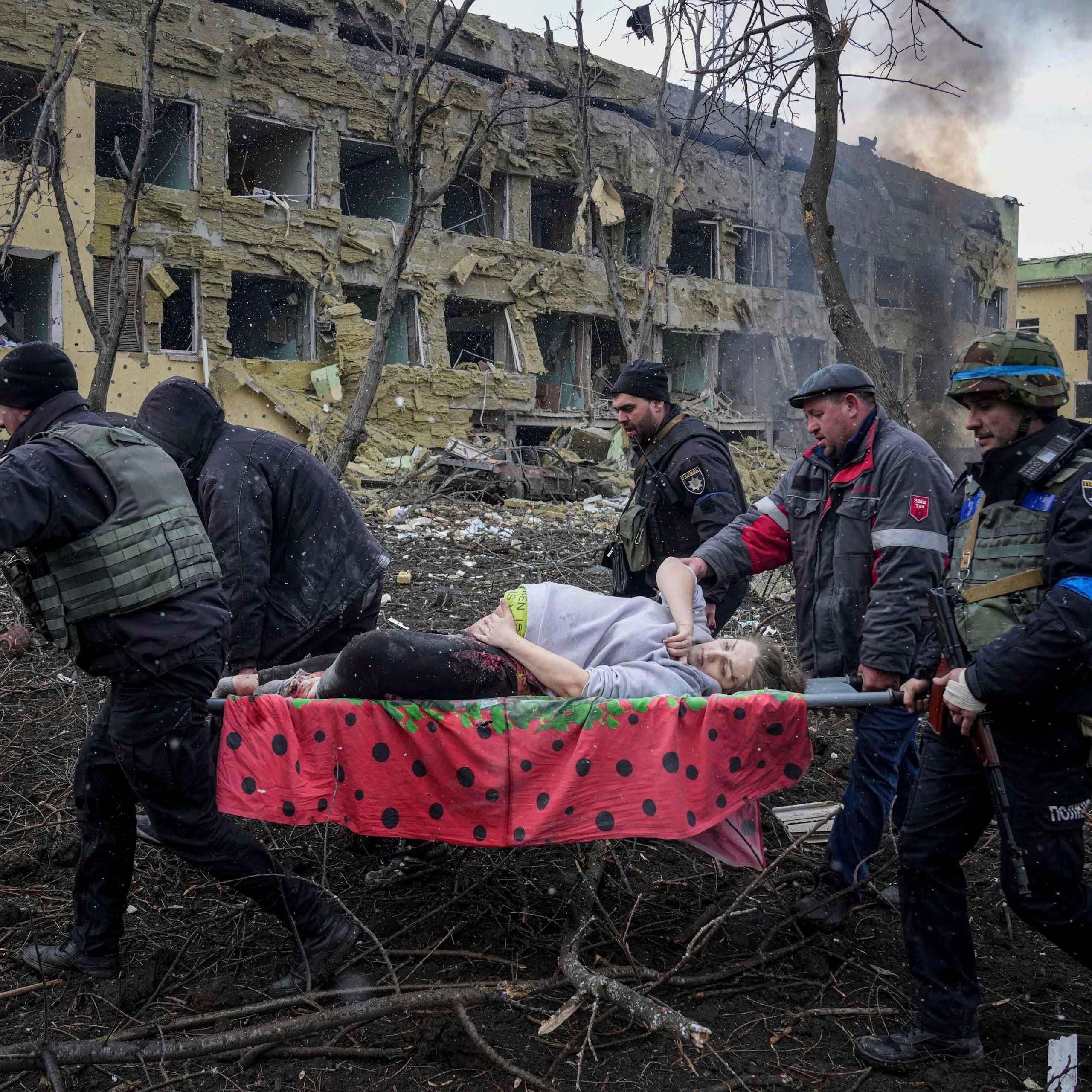 A pregnant woman being evacuated from a hospital in Mariupol, Ukraine, March 9, 2022.