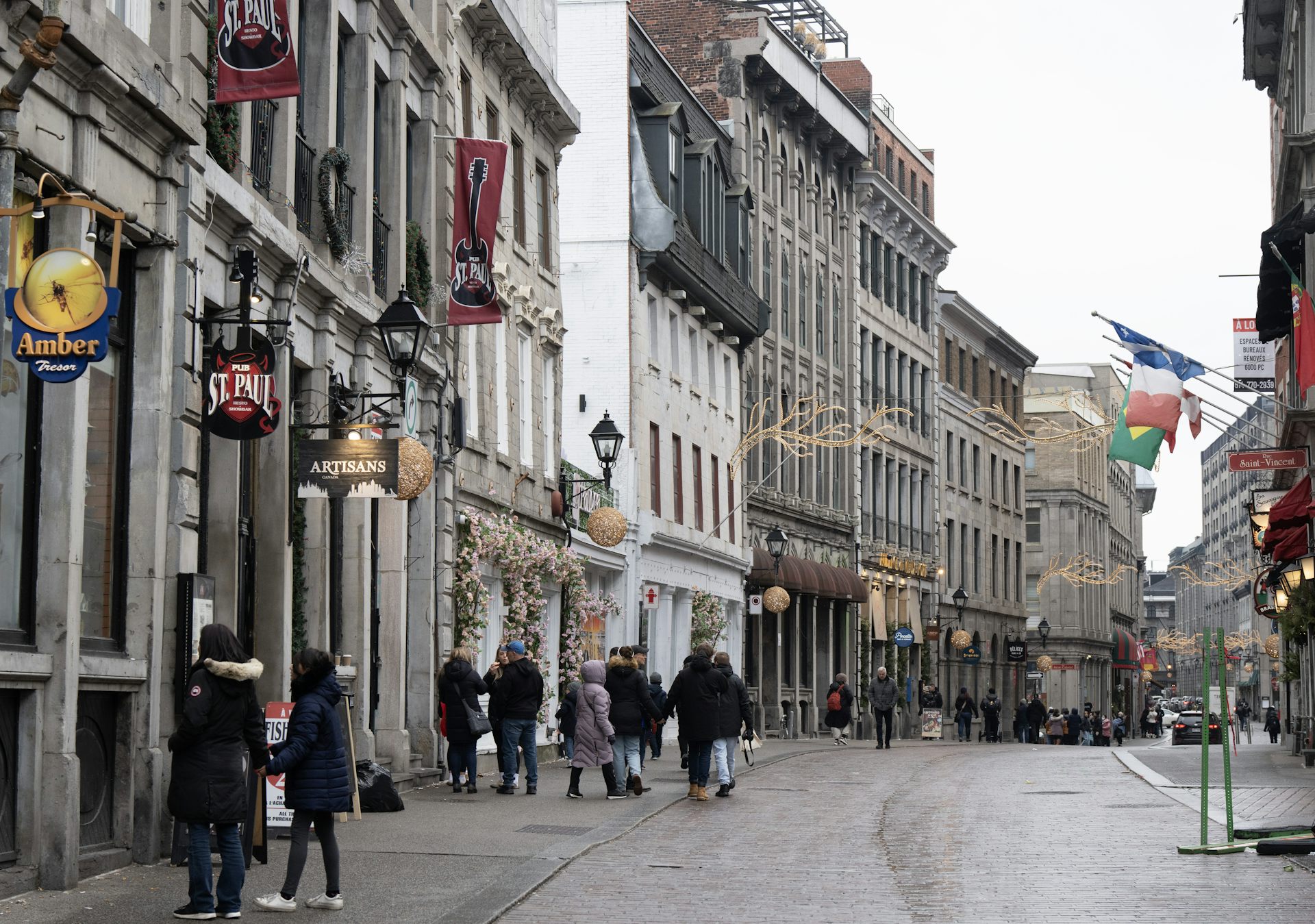 Passers-by walking through streets
