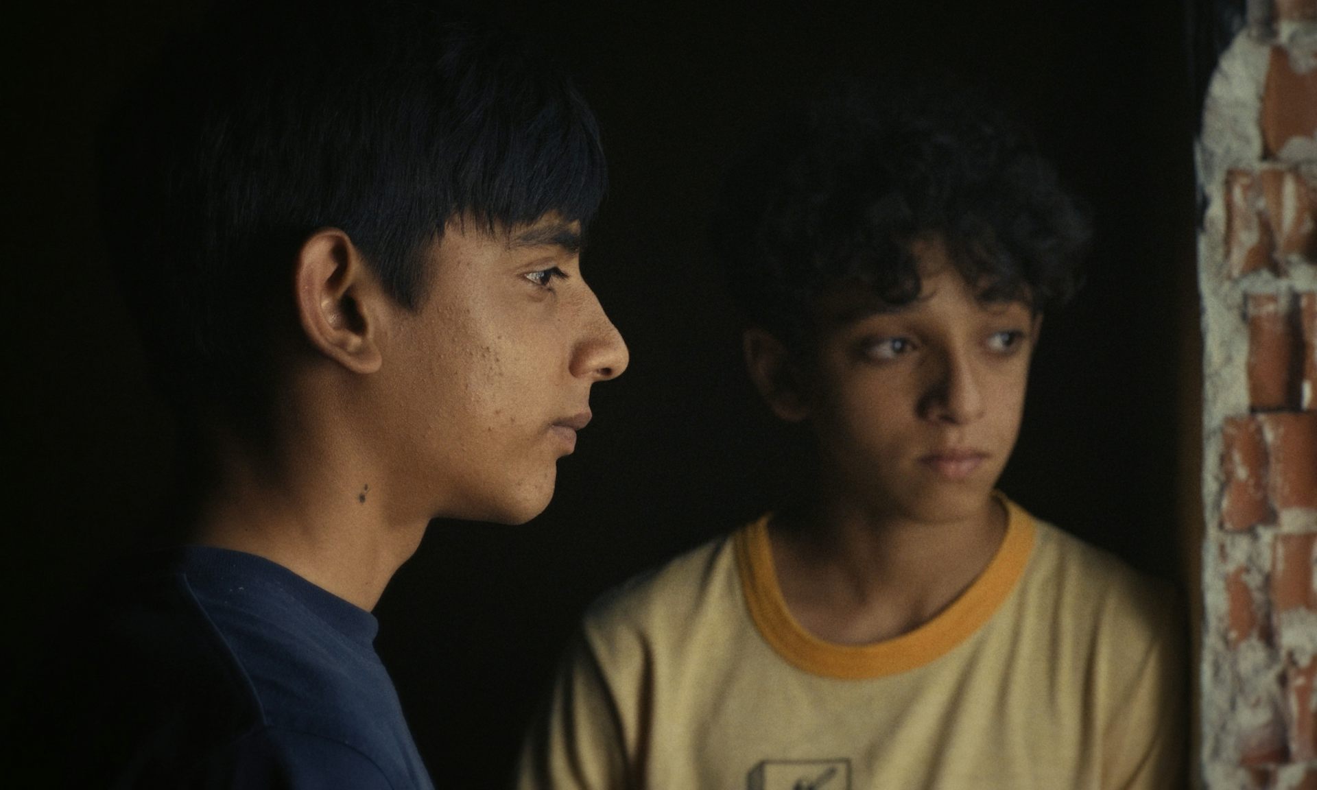 A photo of the teenager in profile and another from the front.