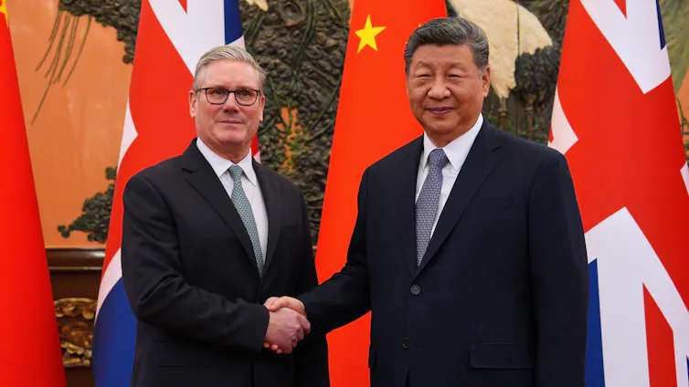 Keir Starmer shaking hands with Chinese President Xi Jinping.