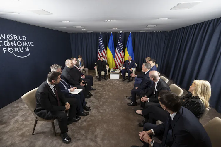 Volodymyr Zelensky and Donald Trump and their teams in talks at Davos.