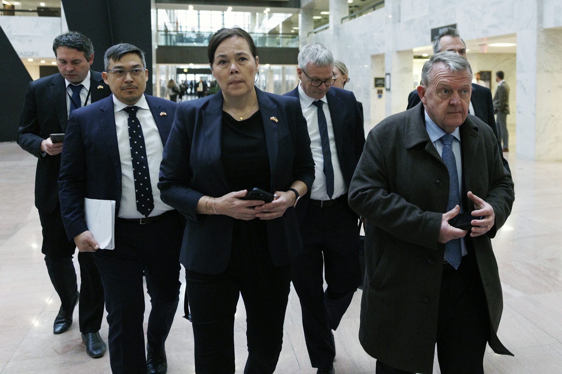 Vivian Motzfeldt and Lars Løkke Rasmussen arrive for a meeting in Washington.