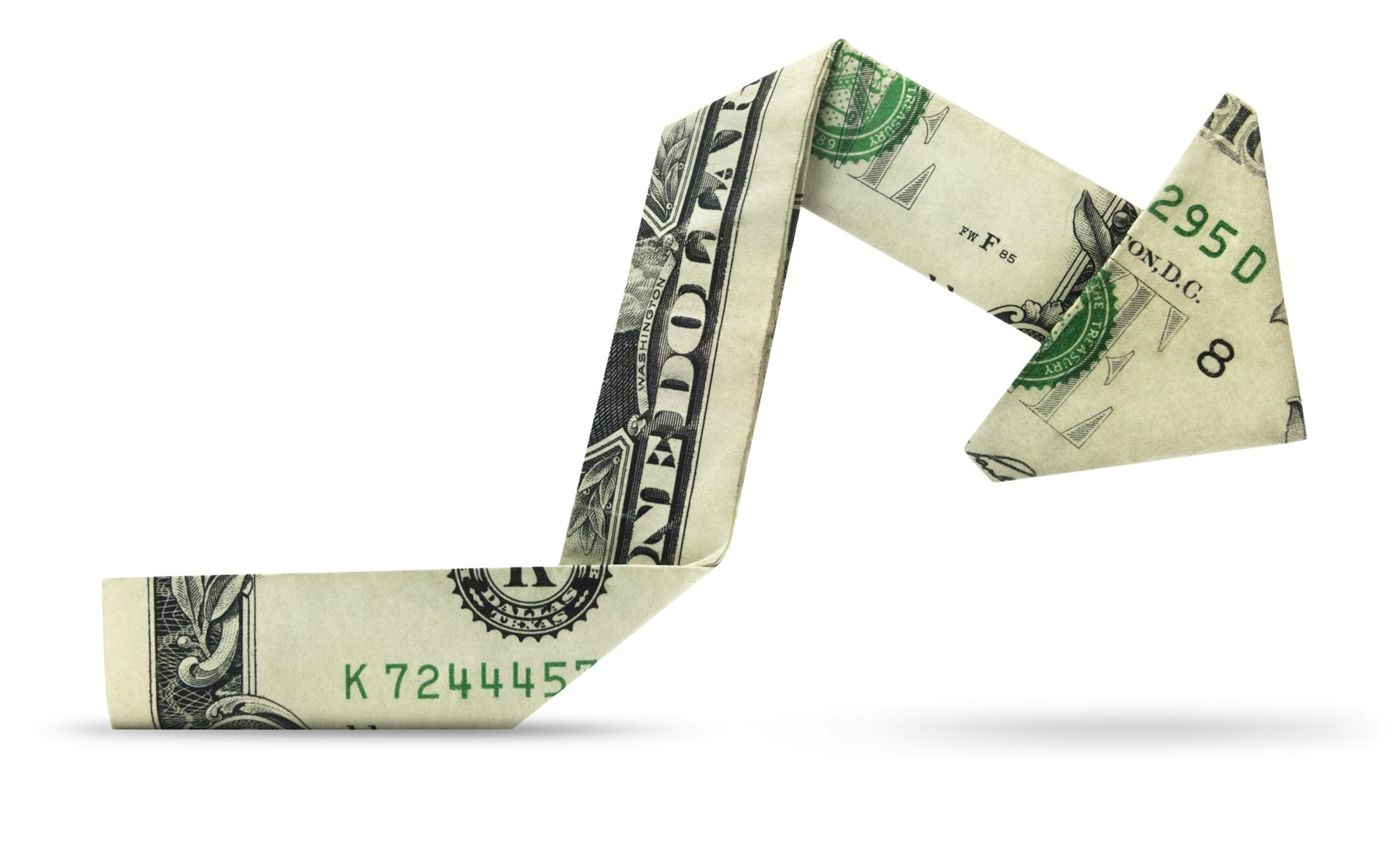 Dollar bill folded up into the shape of a downward pointing arrow.