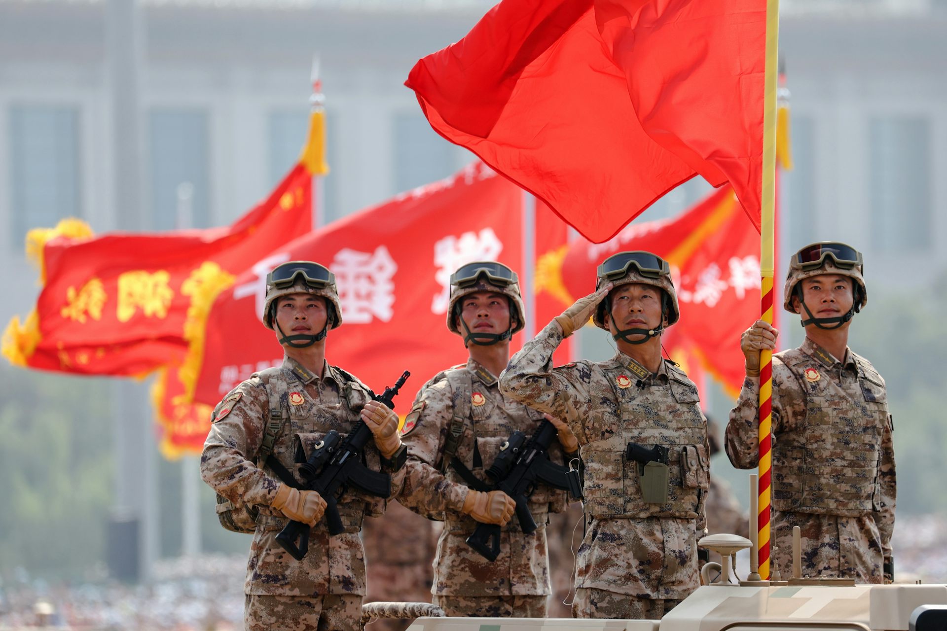 Chinese troops attend a military parade.