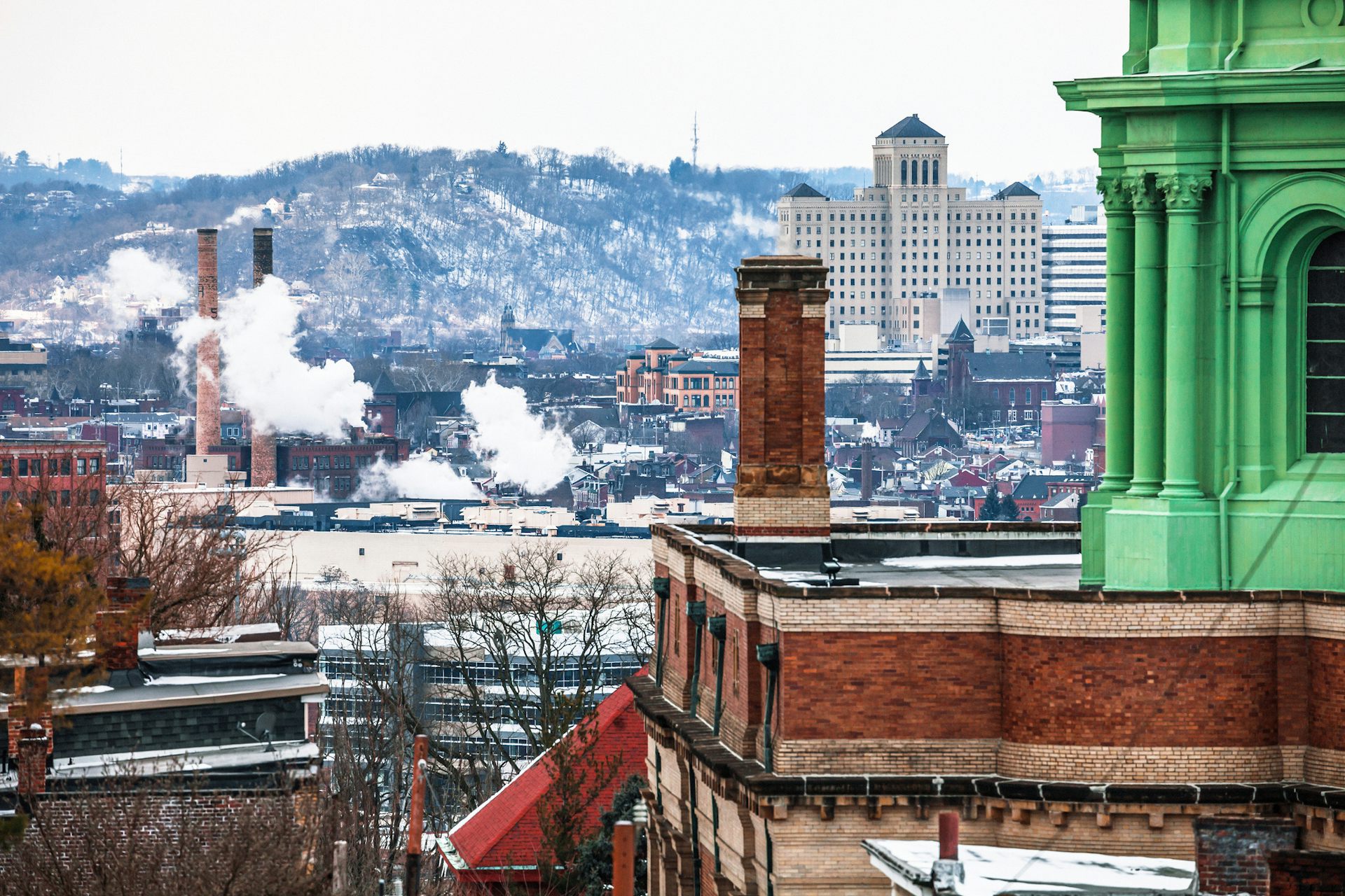 A smoky, industrial shot of Pittsburgh in winter.