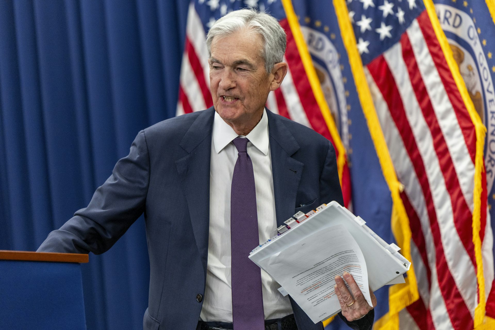 Federal Reserve Board Chairman Jerome Powell departs following a press conference