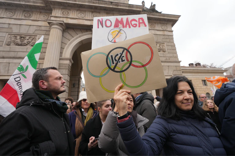 People take part in an Anti-ICE demonstration ahead of the 2026 Winter Olympics in Milan.