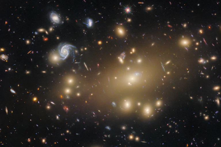 An image of a collection of galaxies and starts in space