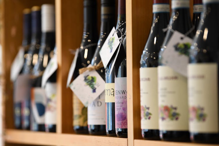 Wine bottles on a shelf in a store