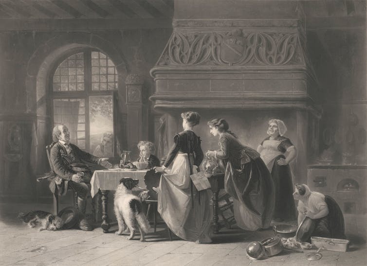 Black and white etching, family members, servants and dogs around a table.