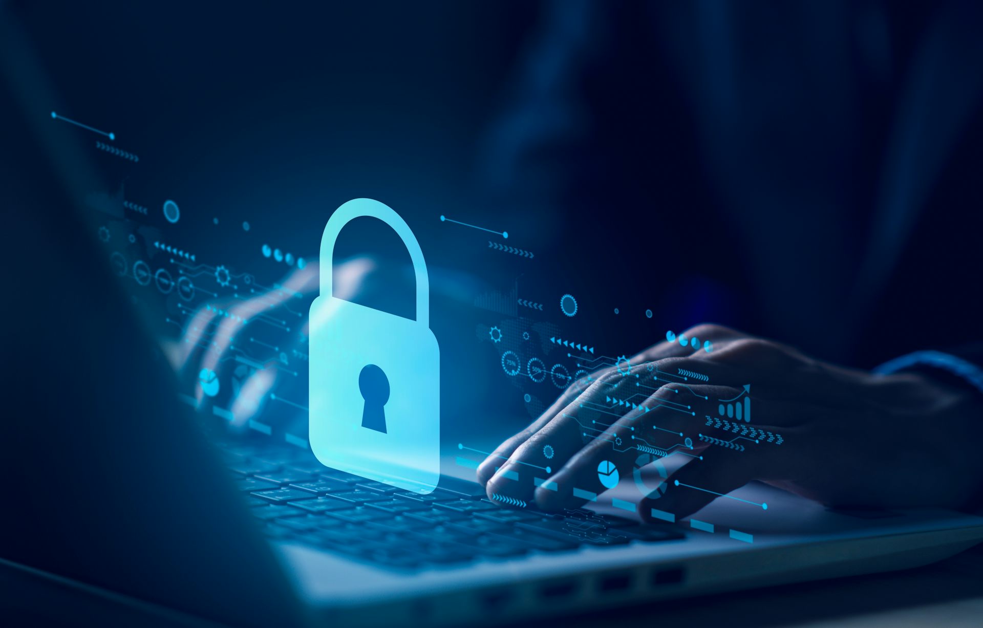 Digital illustration of hands typing on a keyboard in the dark, with a glowing lock emanating from the screen