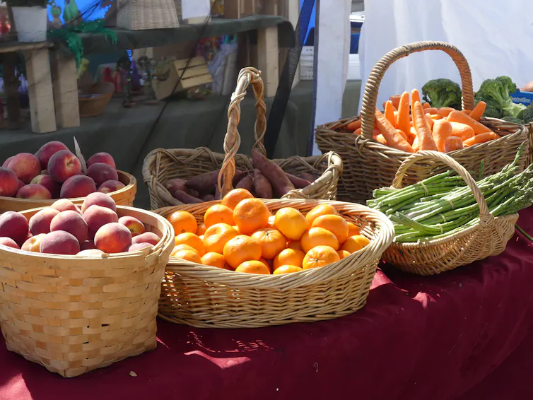 Baskets of fruit and vegetables at a market