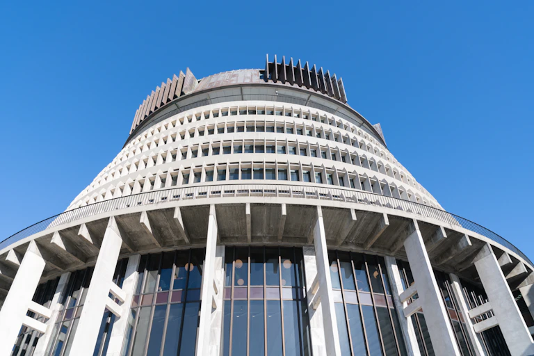 Beehive building in Wellington NZ against blue sky