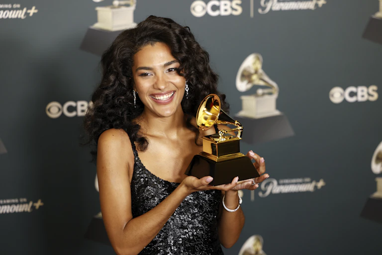 Olivia Dean and her Grammy.