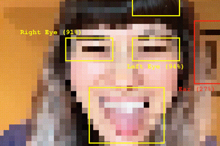 This image features a pixelated selfie featuring an individual with long brown hair and a fringe. The person has their tongue out and is smiling