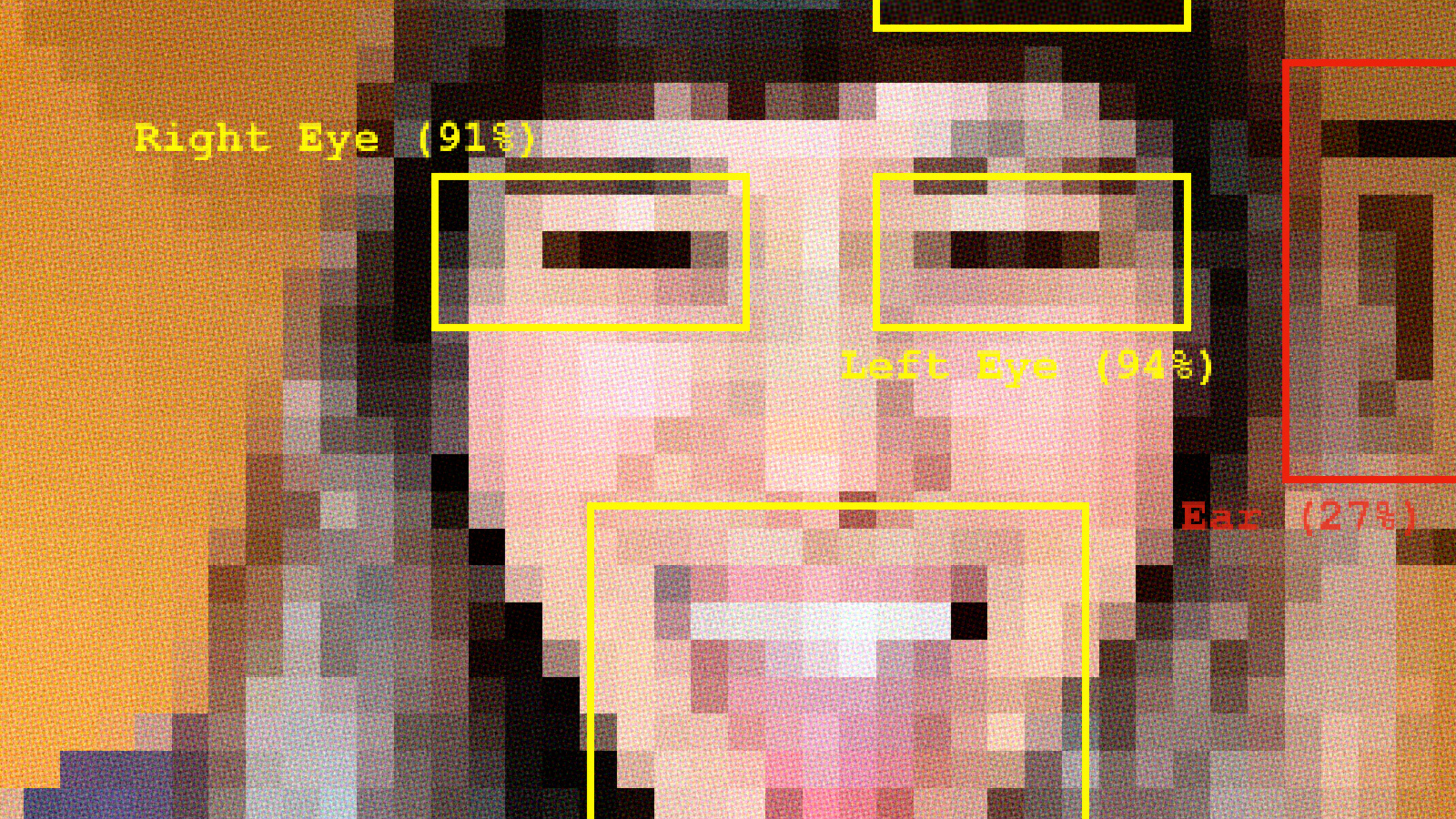 This image features a pixelated selfie featuring an individual with long brown hair and a fringe. The person has their tongue out and is smiling