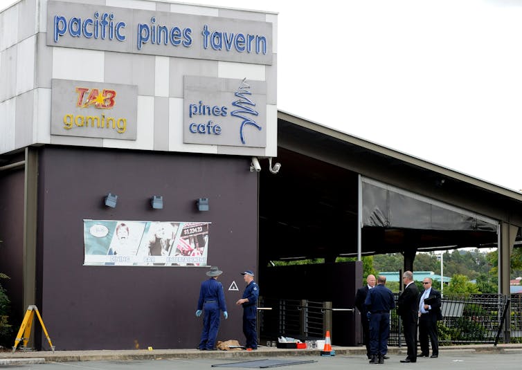 Pacific Pines Tavern, with police outside