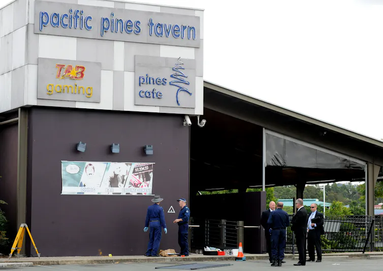 Pacific Pines Tavern, with police outside