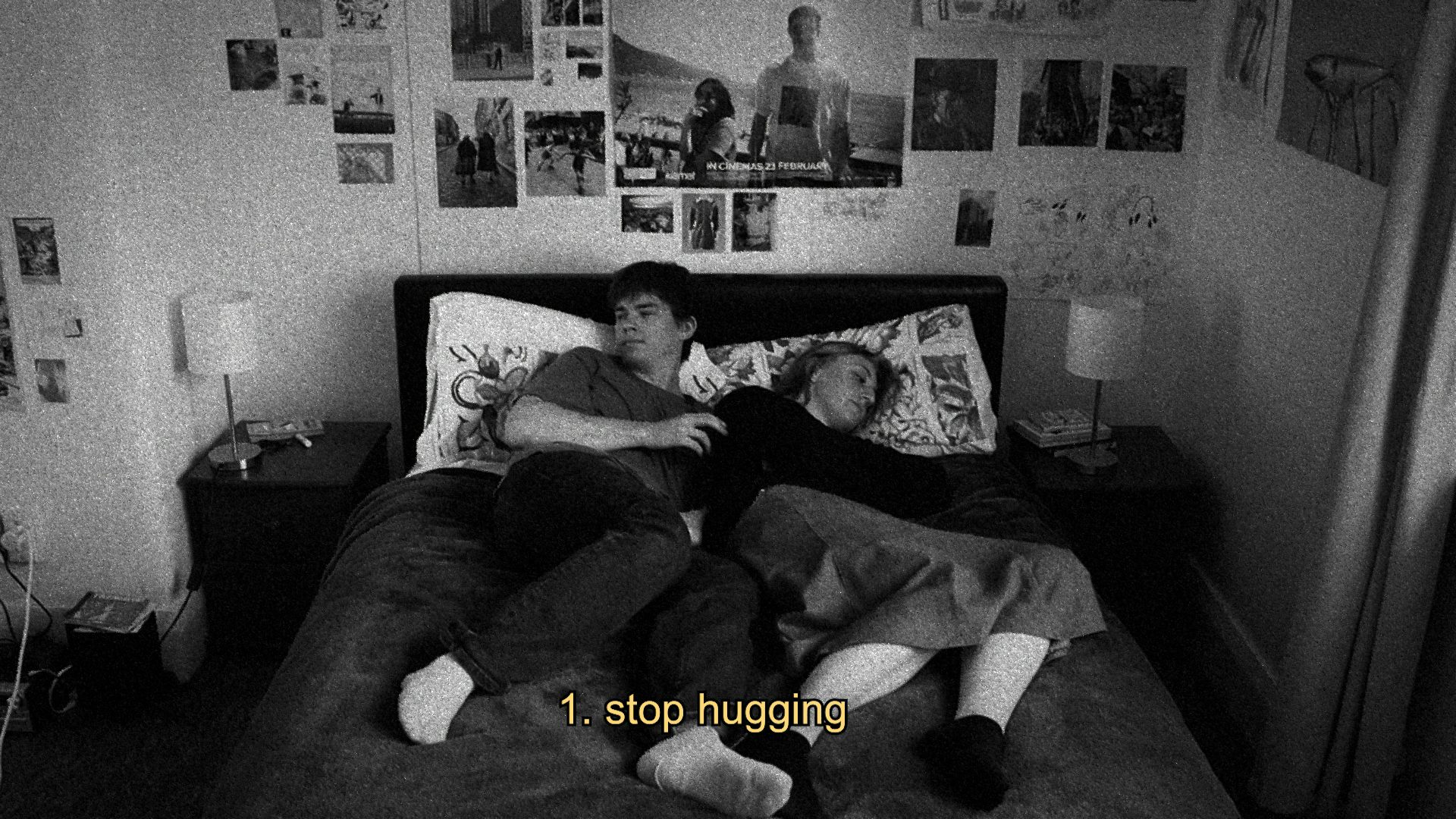 A couple hugging in bed
