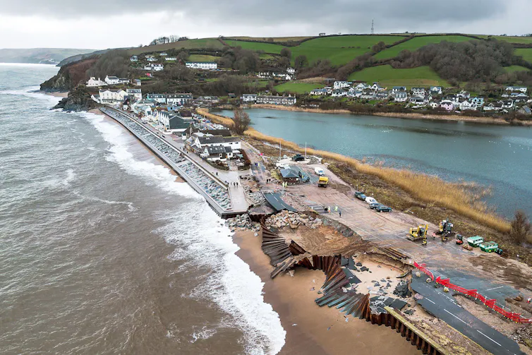 aerial shot of slapton ley and coastal damage with huge break in road structure