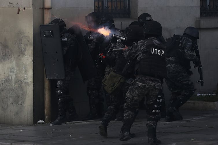 Bolivian police clash with protesters in La Paz.