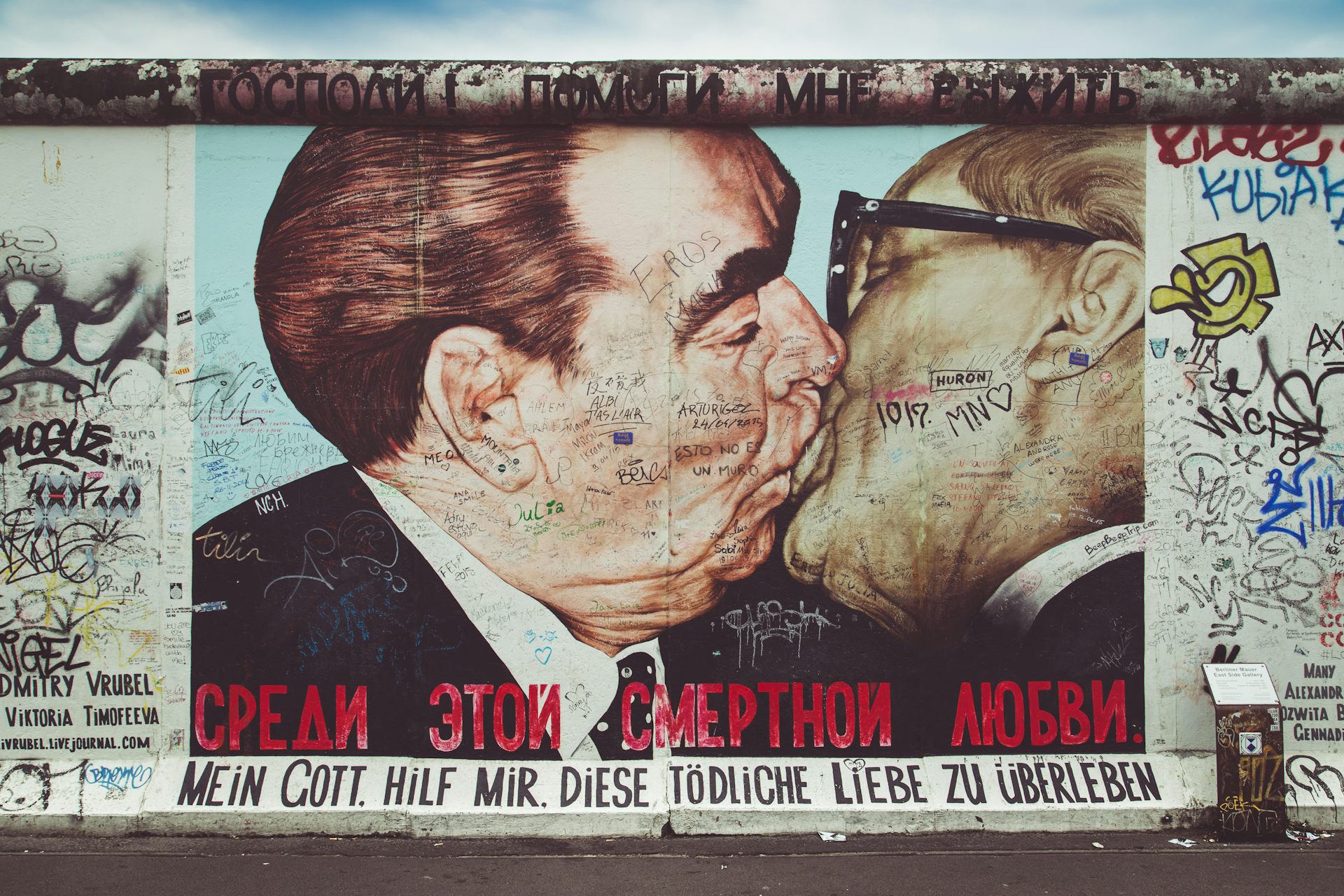 Street art on the Berlin Wall showing Leonid Brezhnev and Erich Honecker kissing