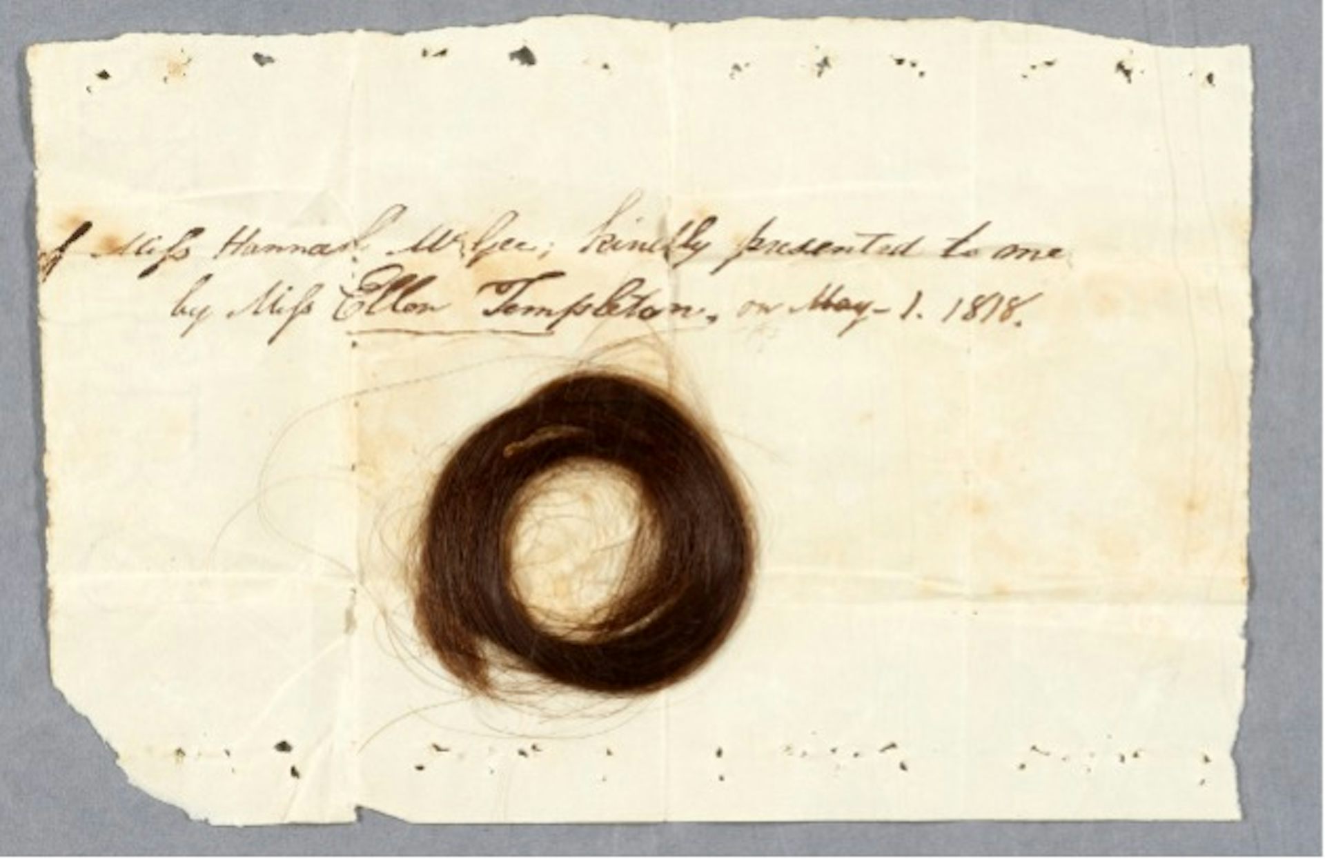 Lock of hair on a piece of paper