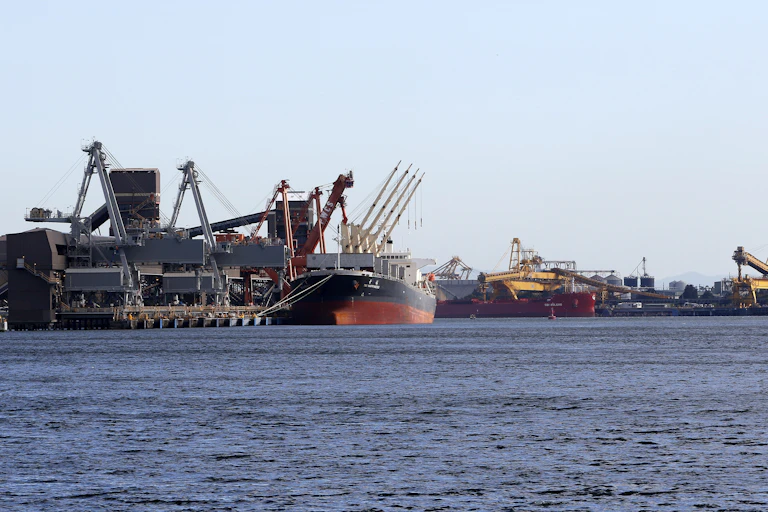 coal port, view of coal carrier, loader and ocean.
