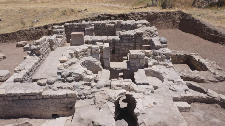 Aerial view of remnants of an ancient Roman bath structure.