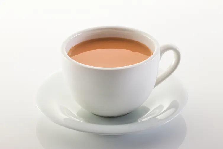 A mug of tea with milk.