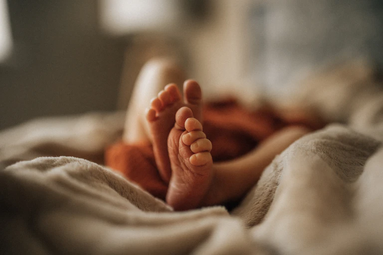Close-up of newborn baby feet