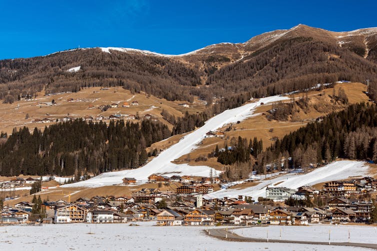 Bare mountainside with single strip of snow