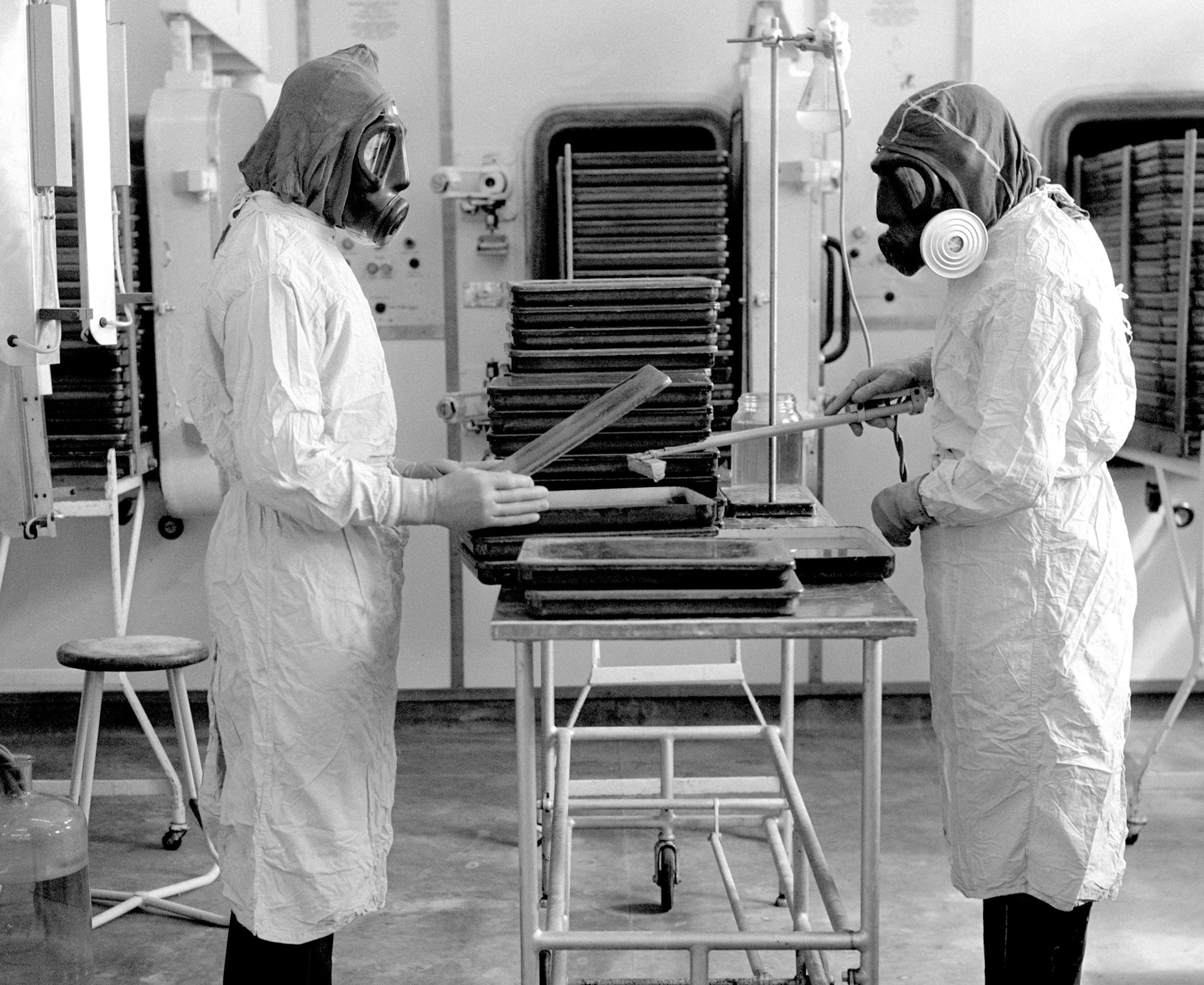 Scientists in protective masks working on a new anthrax vaccine inside Porton Down.