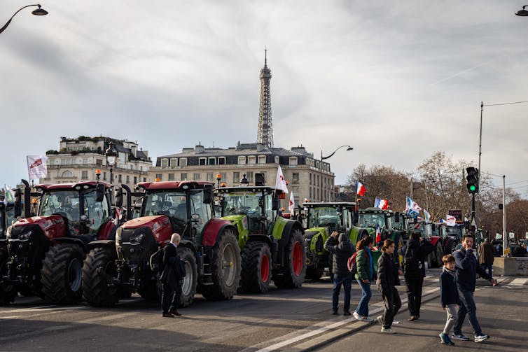Dozens of tractors park in front of the National Assembly and along the Quai D'Orsay in an action organized by the French unions