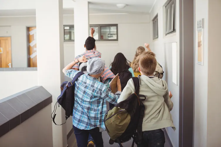 Children in school corridor