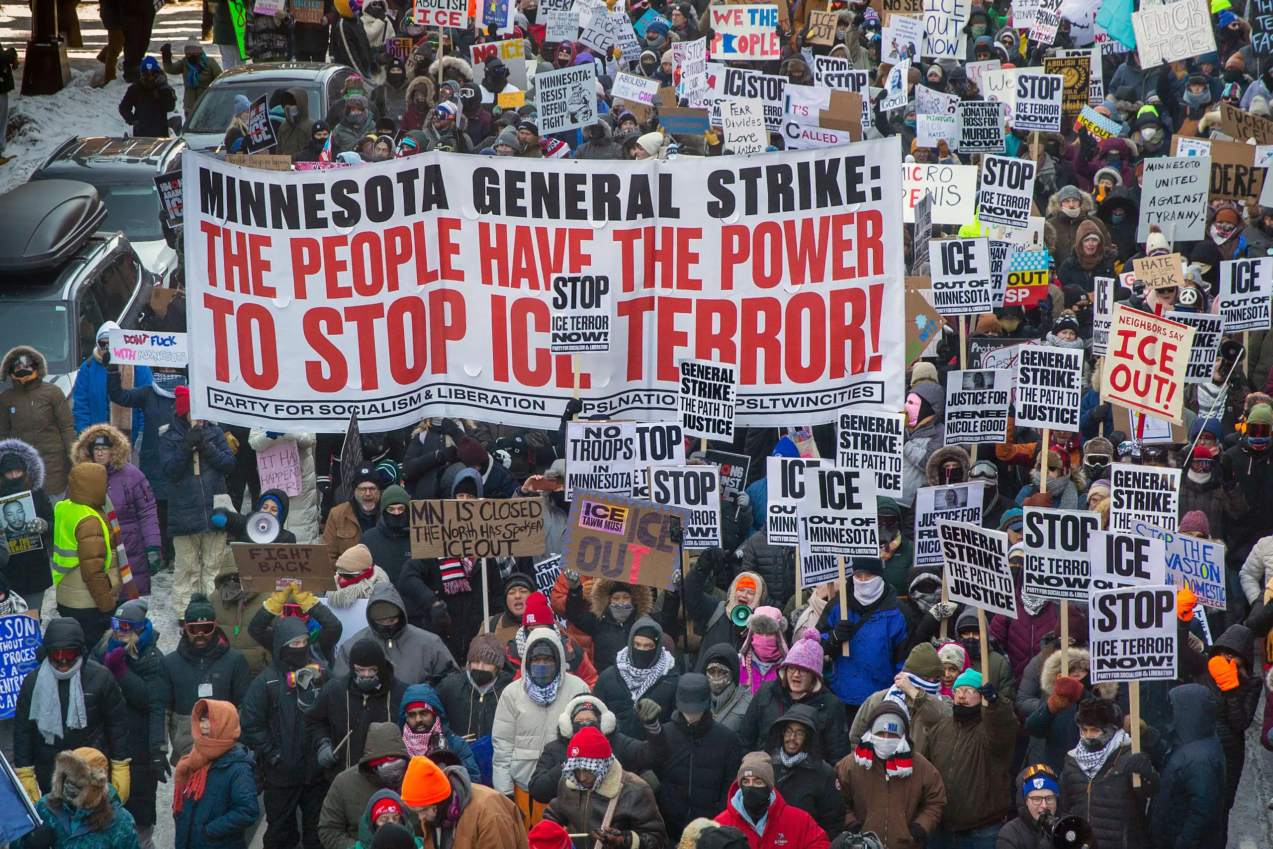 People protest in Minneapolis with a sign saying Minnesota general strike