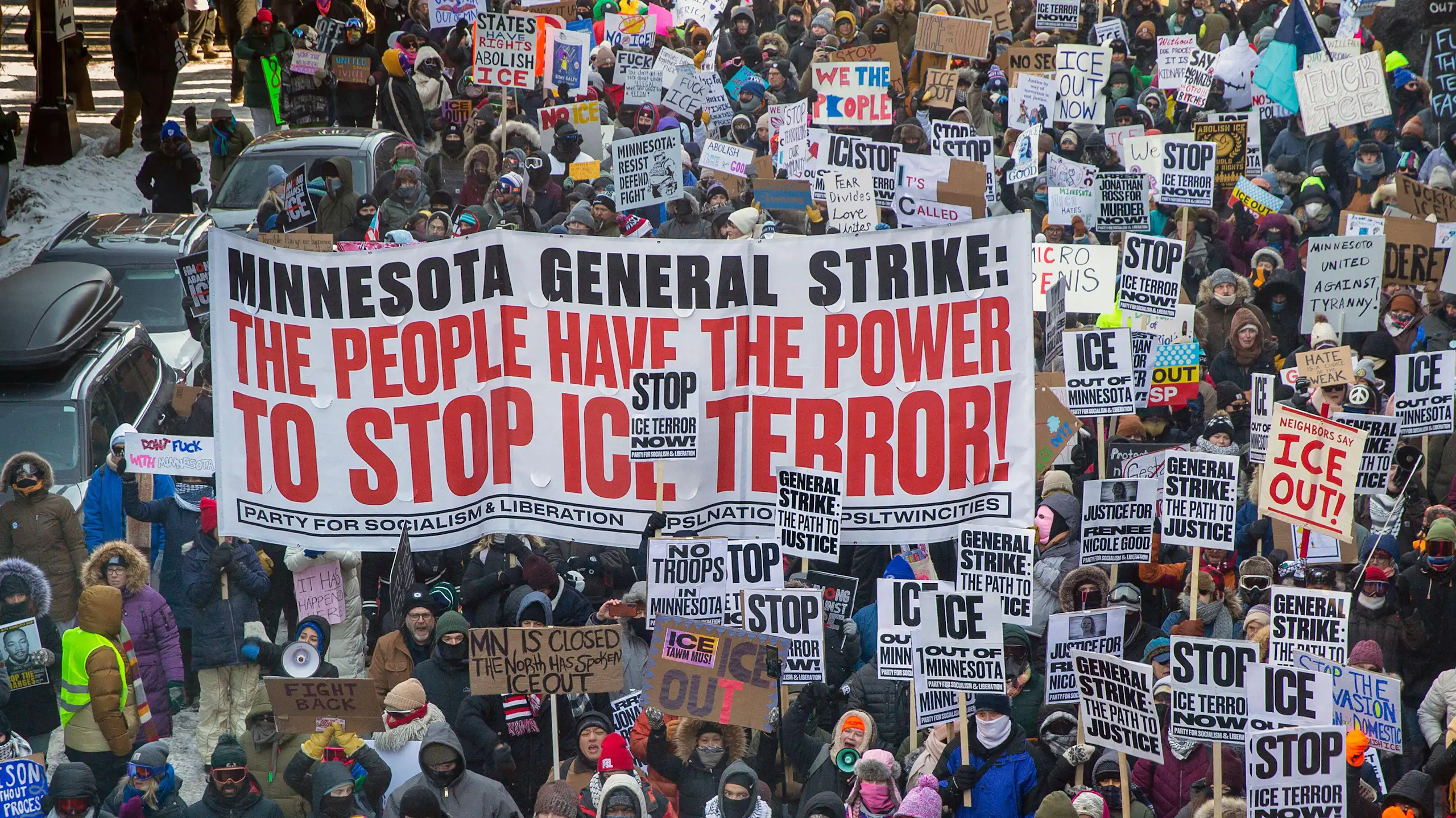 People protest in Minneapolis with a sign saying Minnesota general strike