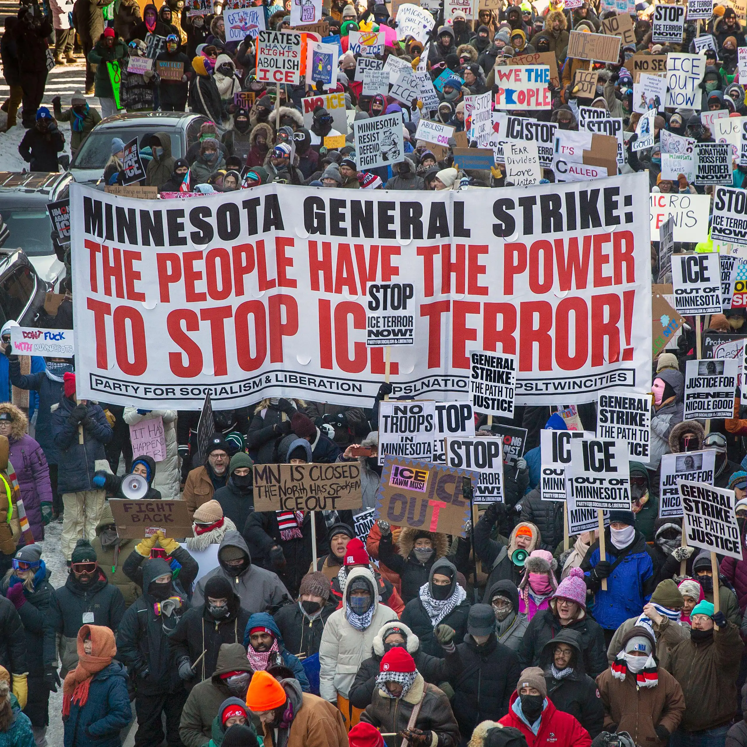People protest in Minneapolis with a sign saying Minnesota general strike