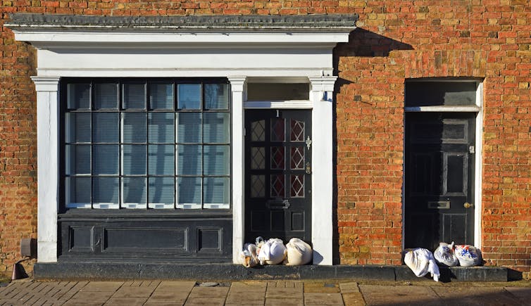 sand bags in doorway of home