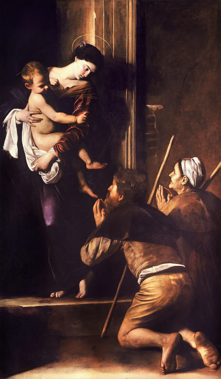 Painting showing two grubby men kneeling at the feet of the Virgin Mary, who holds Christ on her hip