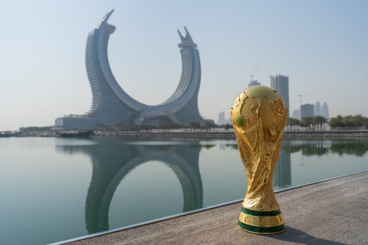 World Cup in front of Doga skyline.