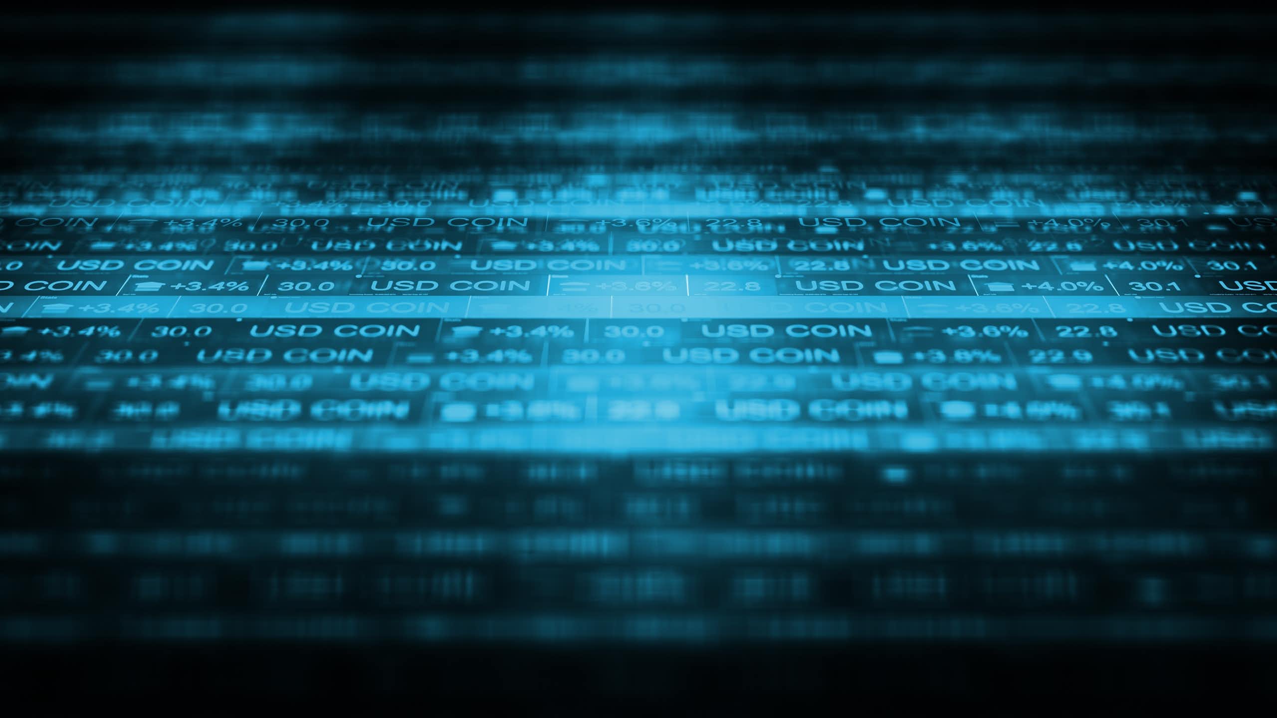 Ecran d'ordinateur avec des USD Coin.