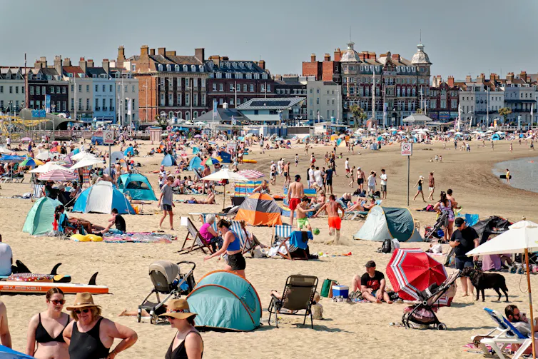 packed Weymouth Beach on a hot day