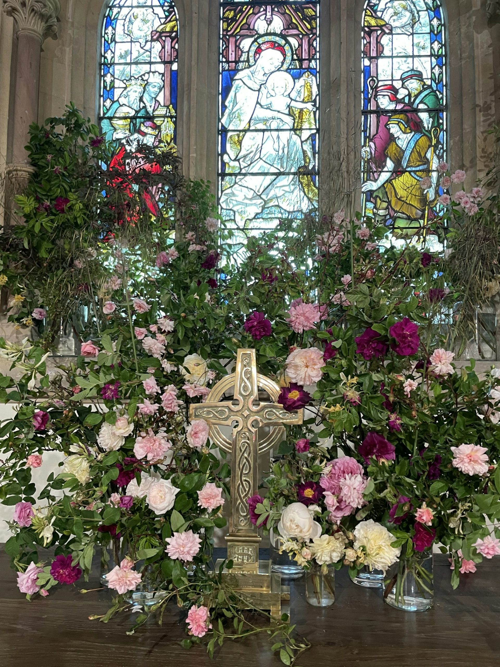 Flowers displayed in a church.