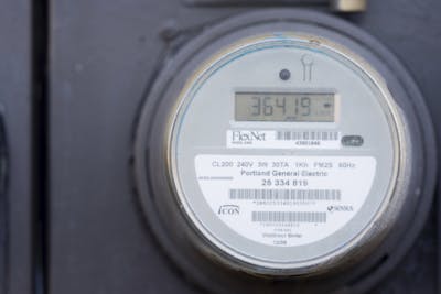 A circular piece of metal with a digital number readout.