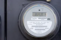A circular piece of metal with a digital number readout.