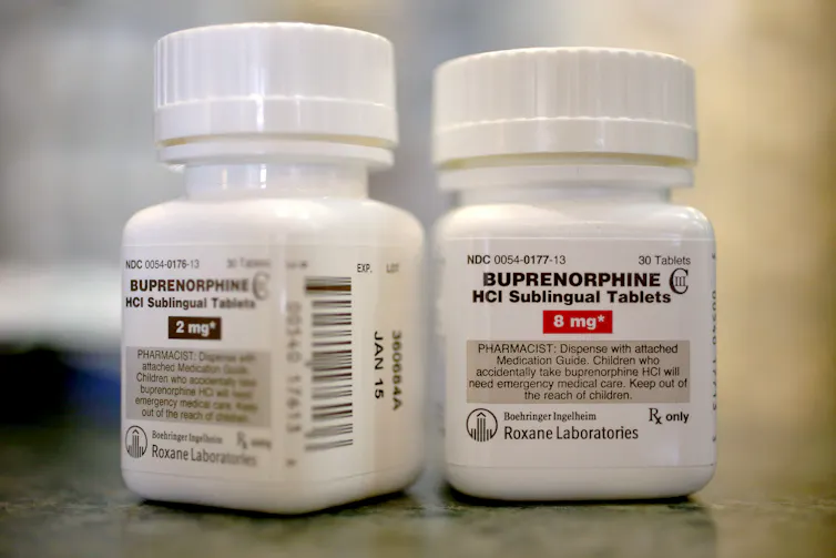 White bottles of prescription medicine