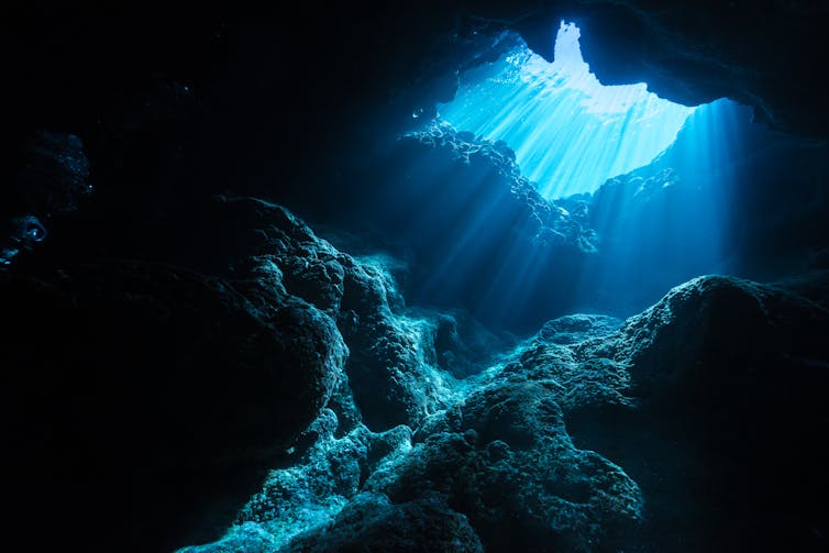 Light illuminating sea cave