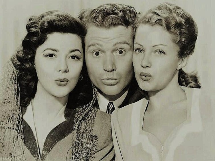 Ann Rutherford, Red Skelton, and Diana Lewis in the American film Whistling in Dixie (1942)