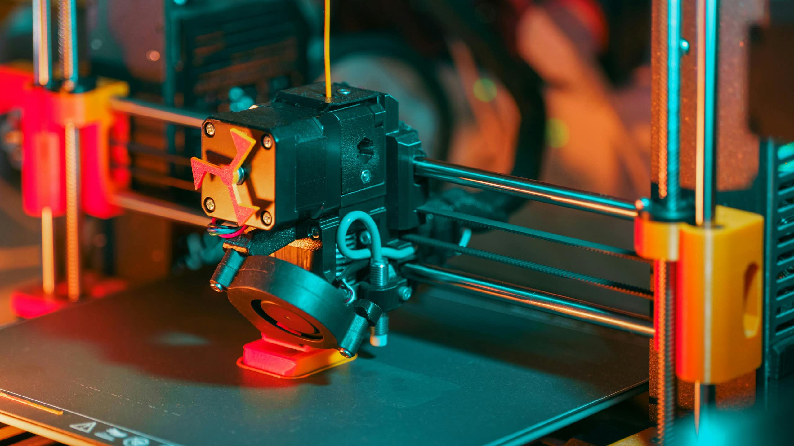 3D printer printing a plastic object.